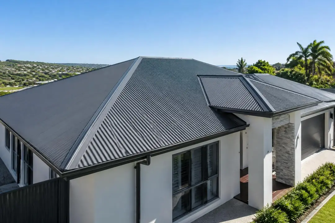 Dark grey corrugated metal roof on a modern house